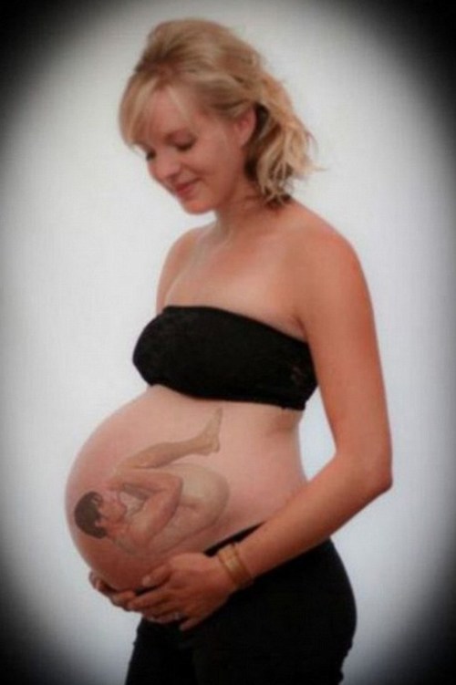 Funny-Pregnancy-Pictures-Man-in-Stomach.jpg