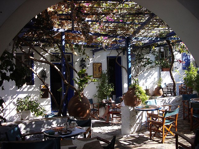 c____________Shady_and_cosy_cafe_on_Amorgos_Island,_Cyclades,_Greece_(by_HCHALKL.jpg