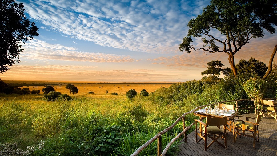 guest-area-with-golden-sunrise-at-andbeyond-bateleur-camp-on-a-luxury-kenya-safari11.jpg