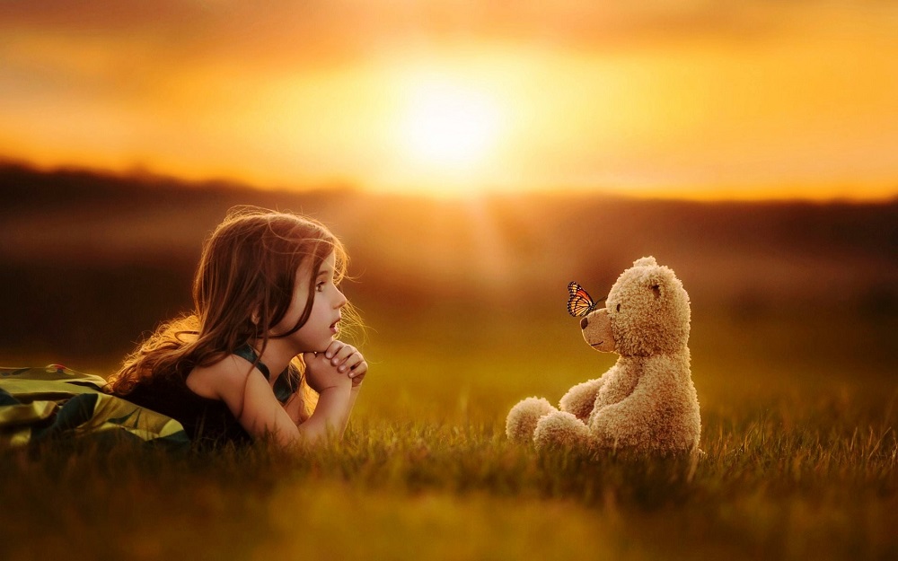 Cute-girl-teddy-bear-butterfly-and-sunset454.jpg