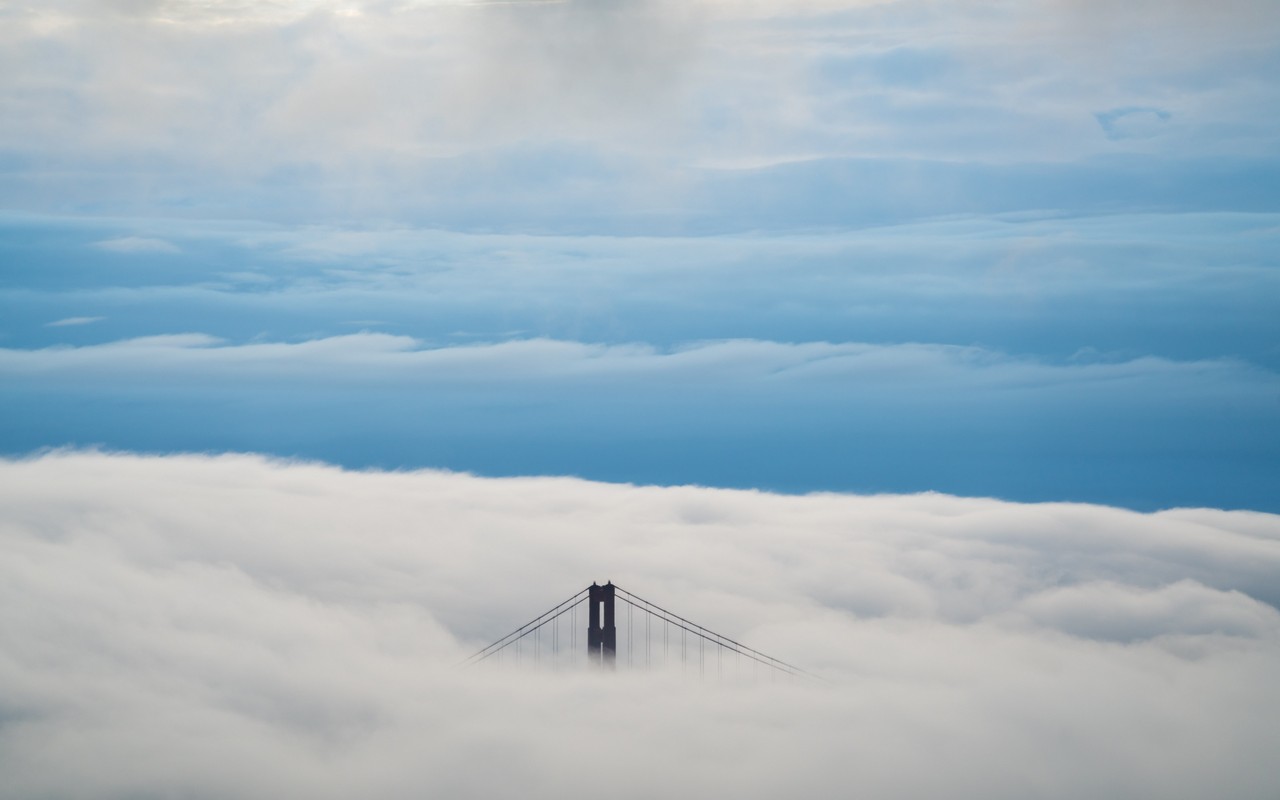 aerial-view-of-bridge-under-clouds-8k-op-3840x2400.jpg