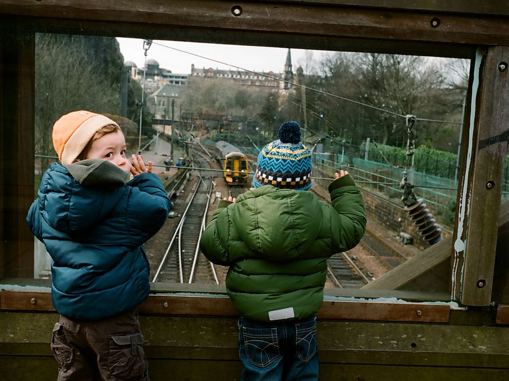  Children looking at a train from above.jpeg
