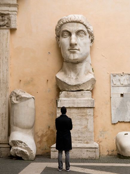  A tourist viewing a statue of Constantine.jpeg